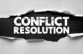 Conflict resolution message revealed through paper tear effect, symbolizing communication, teamwork, leadership, problem-solving, Royalty Free Stock Photo