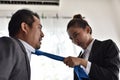 Conflicts in the workplace of women and men. Royalty Free Stock Photo