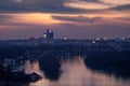 Confluence of the Sava and the Danube rivers with Geneks Tower in background after sunset, Belgrade, Serbia