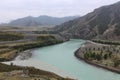 The confluence of two rivers of different colors Chuya and Katun into one. Mountain landscape, Altai Republic, Russia Royalty Free Stock Photo