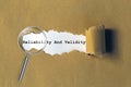 reliability and validity on brown paper Royalty Free Stock Photo