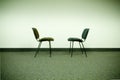 Confronting chairs Royalty Free Stock Photo