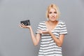 Confused Blonde Young Woman Holding Old Vintage Photo Camera