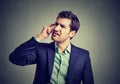 Confused business man thinking scratching his head Royalty Free Stock Photo
