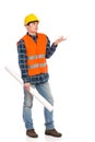 Confused construction worker holding rolled paper plan.
