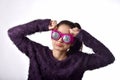 Confused and dizzy asian woman wear funny glasses, Girl`s face expression feeling worry. Royalty Free Stock Photo