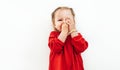 Confused emotions of Little girl dressed red blouse on the white background Royalty Free Stock Photo