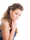 Confused girl in summer dress over white