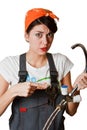 Confused girl trying to repair tap Royalty Free Stock Photo