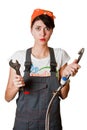 Confused girl trying to repair tap Royalty Free Stock Photo
