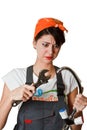 Confused girl trying to repair tap Royalty Free Stock Photo