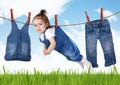 Confused housework creative concept, Funny child hanging on clot