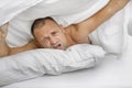 Confused Man Waking Up Royalty Free Stock Photo