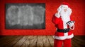 Confused santa claus in front of a blackboard