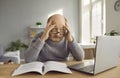 Confused senior man working with laptop having panic look and feeling stressed because of deadline. Royalty Free Stock Photo