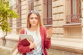 Confused student. Closeup portrait puzzled clueless young woman arm out asking what is problem who cares so what I donÃ¢â¬â¢t know