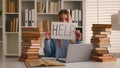 Confused tired student girl teen high school pupil exhausted stressed woman with books laptop studying in university Royalty Free Stock Photo