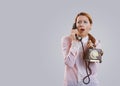 Confused woman with bad news on the phone Royalty Free Stock Photo