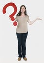Confused woman holding a question mark icon Royalty Free Stock Photo