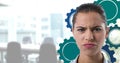 Confused woman in an office with blue cogs