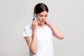 Confused woman portrait phone call focused lady