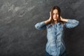 Confused woman puts her hands on the head Royalty Free Stock Photo