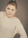 Confused young blonde woman looking suspicious Royalty Free Stock Photo