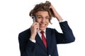 Confused young businessman talking on the phone and scratching head Royalty Free Stock Photo