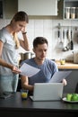 Confused young couple worried checking domestic bills having fin Royalty Free Stock Photo