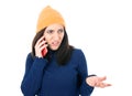 Confused young woman holding the phone, isolated on white background. Female person with smartphone. Nuisance concept