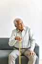 Confusing and forgetful elderly asian man with thinking gesture, Alzheimer`s disease. Royalty Free Stock Photo