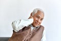 Confusing and forgetful elderly asian man with thinking gesture, Alzheimer`s disease. Royalty Free Stock Photo