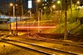 Trains in motion on long exposure at night Royalty Free Stock Photo