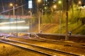 Trains in motion on long exposure at night Royalty Free Stock Photo