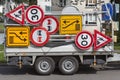 Confusing traffic signs on a trailer Royalty Free Stock Photo