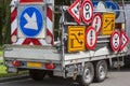 Confusing traffic signs on a trailer Royalty Free Stock Photo