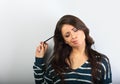 Confusion grimacing brunette woman thinking Royalty Free Stock Photo