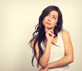 Confusion grimacing serious brunette woman thinking and looking Royalty Free Stock Photo