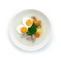 Congee Rice Porridge Served   Salt Egg,Pork soft Ball Royalty Free Stock Photo