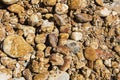 Conglomerate iron stained rock stone wall background