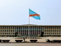 Congolese flag in front of the Congolese National Assembly