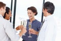 Congratulating a new CEO. a group of businesspeople toasting to their success with champagne. Royalty Free Stock Photo