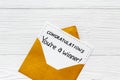Congratulations award concept -You are a winner card in golden envelope