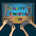 Congratulations international friendship day. Hands holding joysticks TV video game with characters gifts. Vector image
