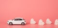 Congratulations on st valentine day concept. Side profile close up view photo of mini modern car riding and leaving behind small