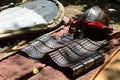 Conical helmet with nosepiece and middle east arabic type of decoration, early plate armor and kite shield