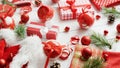 Conifer twigs and baubles near Christmas gifts