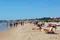 Tourists relaxing on the beach, Conil de la Frontera, Spain.