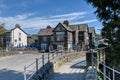 Coniston, United Kingdom - 21st April 2022 : The Yewdale Inn at the centre of town is a popular pub and restaurant