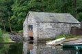 CONISTON WATER, LAKE DISTRICT/ENGLAND - AUGUST 21 : Old Boathouse on Coniston Water in the Lake District England on August Royalty Free Stock Photo